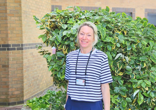 Laura Hayes standing in front of Alliance Homes' office in Weston-super-Mare.