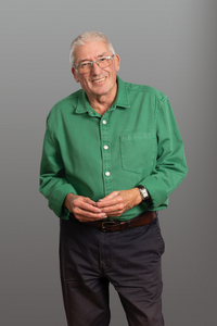 Gent wearing a green shirt and glasses