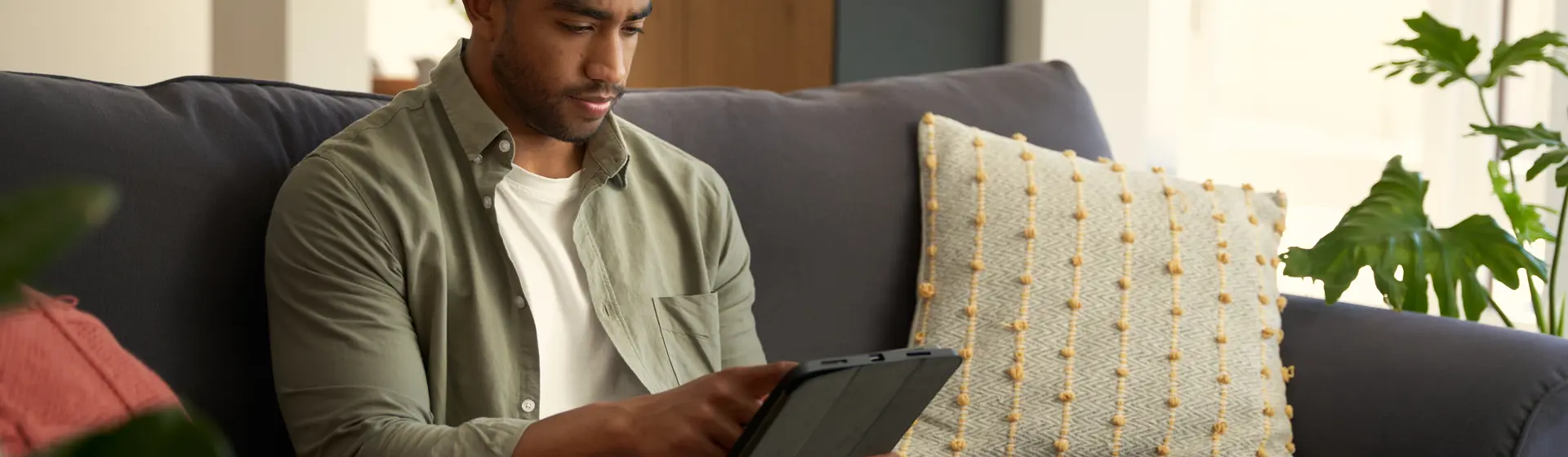 young man on ipad