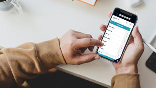Istock 1184955999 Mans Hand Holding Blank Smartphone With Connect Screen 2000 X 1000